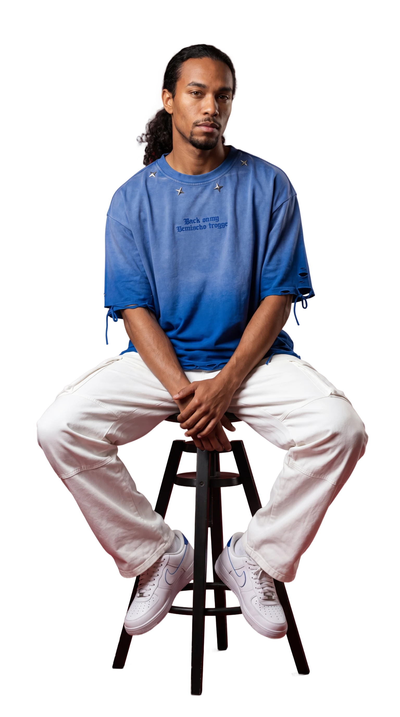 AI generated male streetwear model sitting on a stool in a blue t-shirt and white cargo pants - Stylic AI